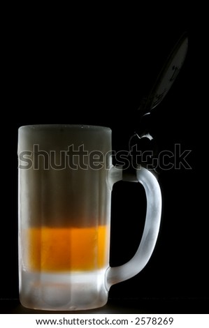 Frosted beer stein with beer and backlighting