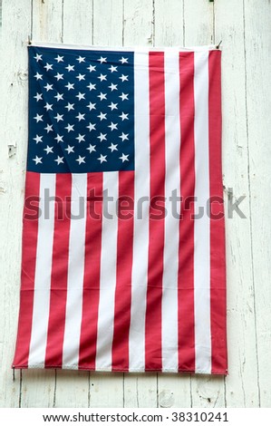 US flag on side of rural barn