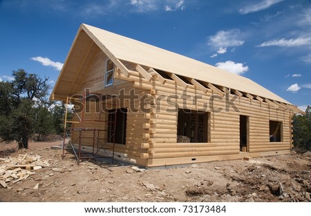 New log home construction site. Catron County, New Mexico, USA.