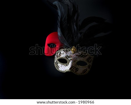 Red and Fancy Masks Isolated on Black