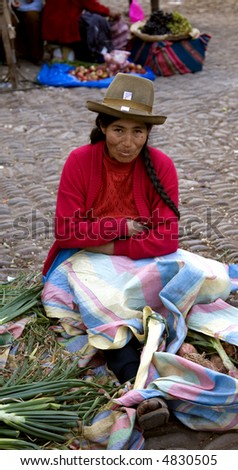 Peruvian Women Selling Vegetables in Market at Pisac Peru Sacred Valley