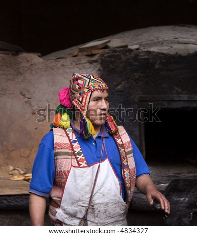 Peruvian Man Baking Break Pisac Peru