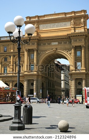 ITALY, FLORENCE - JUNE 26, 2008: In honor of King Victor Emmanuel II was built impressive size Arch at the Piazza della Repubblica. Every day a lot of tourists visit this place.