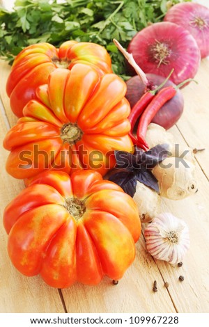 American ribbed tomatoes with spices, vegetable still life