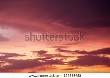 Beautiful Sunset / sunrise with clouds, in pink and purple shades