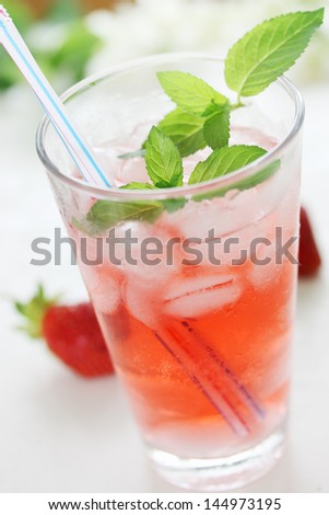 Summer cold drink with strawberry and mint