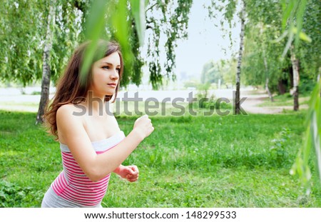 woman on a morning jog in the park