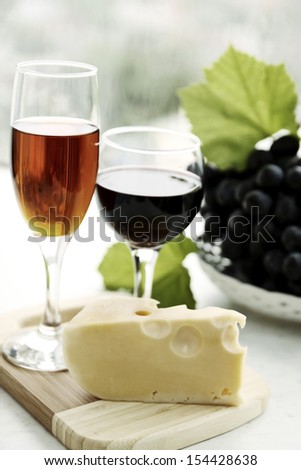 still life with  wine glass, cheese and grapes