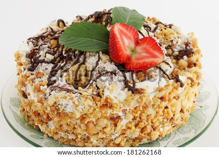 Cake with nuts chocolate strawberry and mint