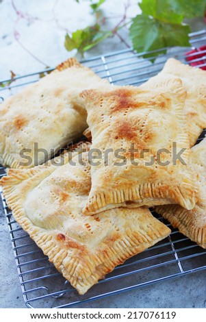 Pies with apples of puff pastry, homemade cakes
