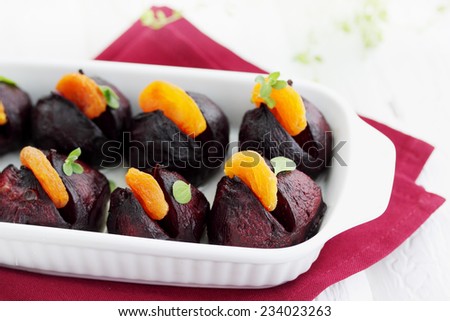 Baked beet with dried apricots and sour cream