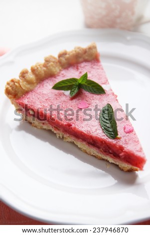 Cake with strawberry jelly with mint and hearts