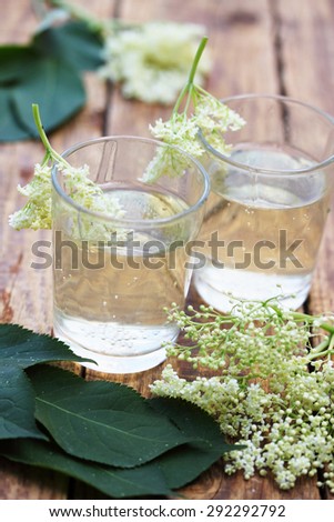elder brew of elder flowers in a glass