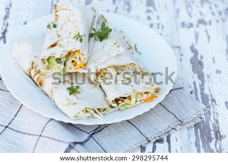 salad in pita bread on the plate