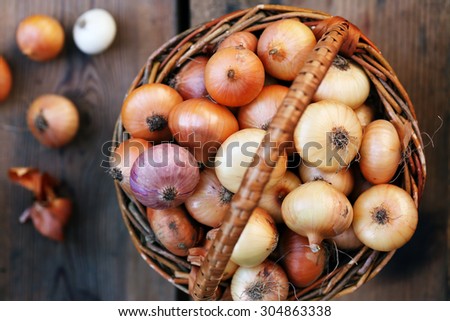 small onion in a wicker basket from vines