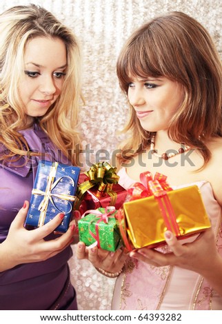 Two friends change by the Christmas gifts