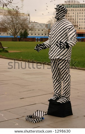 Street performer near London Eye