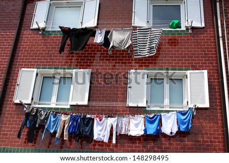 Drying clothes on a rope from a window in San Sebastian, Spain.