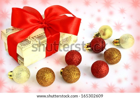 Christmas toys and gift on pink fairy background.