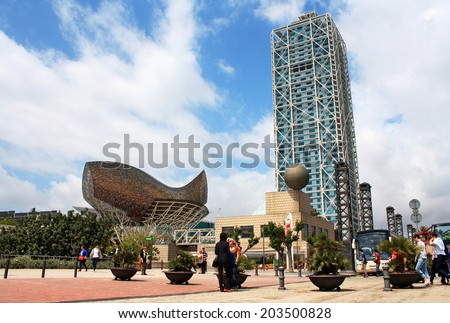 BARCELONA, SPAIN - MAY 11, 2013: Tourists in the Olympic village, built for the Summer Olympic games of 1992.