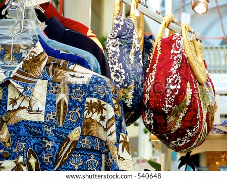 Hawaiian style shirts and bags on display in this bright boutique