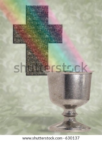 Rainbow beams into silver chalice in foreground with cross in background