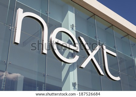 YORK, UNITED KINGDOM  APRIL 15, 2014: Entrance sign of the Next store in York, UK. Next plc is one of the largest clothing, footwear and home products retailers in the UK