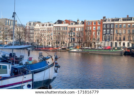 Houses along the Amstel river in the city of Amsterdam, the netherlands