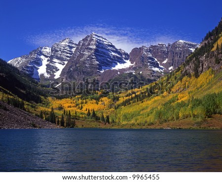 The twin peaks of the Maroon Bells and Maroon Lake in the White River National Forest of Colorado.