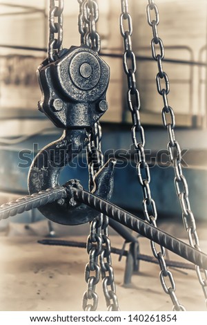 Crane chain and hook at the factory.