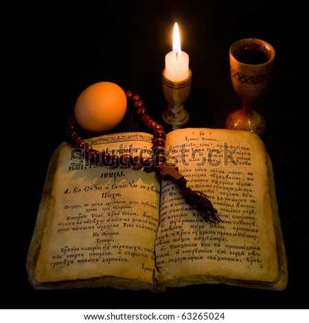 Prayer Book by candlelight in the shade.
