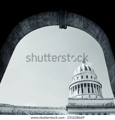 The capitol of Havana seen from under an arch in Cuba