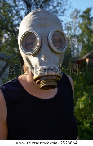 portrait of woman in old gas-mask