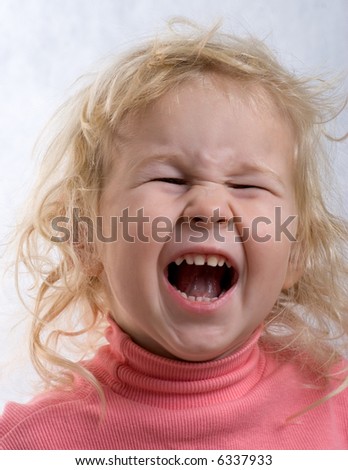 close-up portrait of happy smiling baby on white background