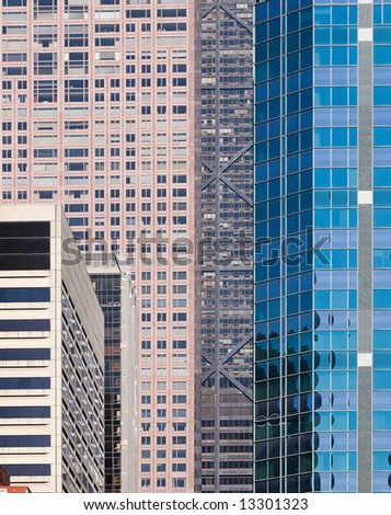 pattern of tall modern urban buildings standing without gaps between them