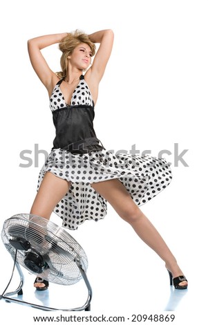 Beautiful woman in white-black dress with ventilator isolated on white