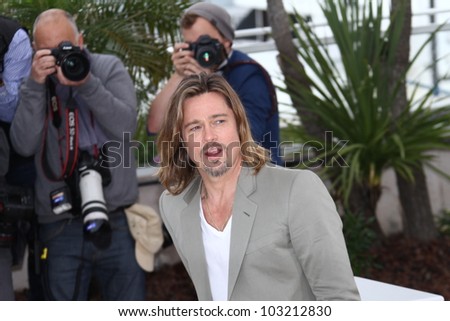 CANNES, FRANCE - MAY 22: Brad Pitt poses at the \'Killing Them Softly\' photocall during the 65th Annual Cannes Film Festival at Palais des Festivals on May 22, 2012 in Cannes, France.