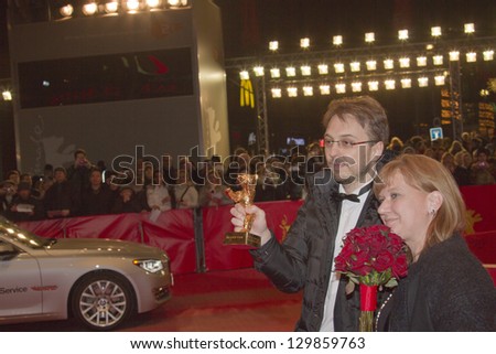 BERLIN, GERMANY - FEBRUARY 16: Calin Peter Netzer (winner of Golden Bear) and Ada Solomon attend the Closing Ceremony At The 63rd Berlinale Festival at Palast on February 16, 2013 in Berlin, Germany.