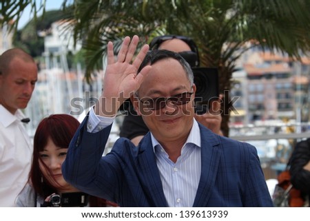 CANNES, FRANCE - MAY 20: Johnnie To attends the photocall for \'Blind Detective\' during The 66th Annual Cannes Film Festival at Palais des Festivals on May 20, 2013 in Cannes, France.