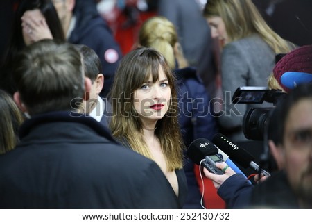 BERLIN, GERMANY - FEBRUARY 11: Dakota Johnson attends the \'Fifty Shades of Grey\' premiere during the 65th Berlinale Film Festival at Zoo Palast on February 11, 2015 in Berlin, Germany.