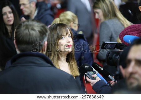 BERLIN, GERMANY - FEBRUARY 11: Dakota Johnson  attends the \'Fifty Shades of Grey\' premiere during the 65th Berlinale Film Festival at Zoo Palast on February 11, 2015 in Berlin, Germany.