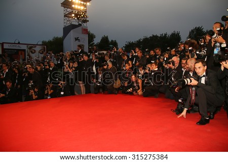Photographer attend the premiere of the movie \'BLACK MASS\' during the 72nd Venice Film Festival on September 4, 2015 in Venice, Italy.