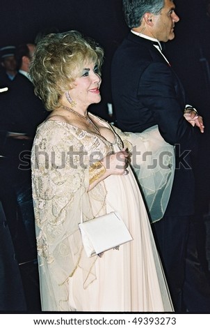 CANNES, FRANCE - MAY 23: Elizabeth Taylor  arriving at amfAr\'s Cinema against AIDS 2002 benefit gala at Le Moulin de Mougins during the 55th Cannes Film Festival May 23, 2002 in Cannes, France