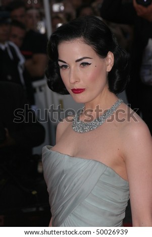 CANNES, FRANCE - MAY 24: Dita Von Teese attends the premiere for the film \'Ocean\'s Thirteen\' at the Palais des Festivals during the 60th Cannes Film Festival on May 24, 2007 in Cannes, France
