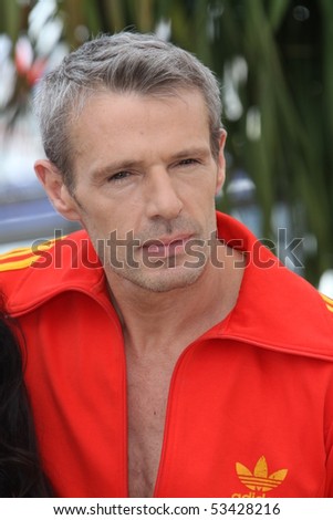 CANNES, FRANCE - MAY 18: Actor Lambert Wilson attends the 'Of Gods And Men' Photocall at the Palais des Festivals during the 63rd  Cannes Film Festival on May 18, 2010 in Cannes, France