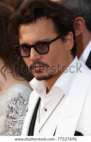 CANNES, FRANCE - MAY 14: Actor Johnny Depp attends the 'Pirates of the Caribbean: On Stranger Tides' premiere at the Palais  during the 64th Cannes Film Festival on May 14, 2011 in Cannes, France.