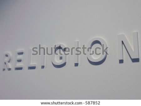 The Word &Quot;Religion&Quot; Embossed On A White Wall, Partially ... The Word &Quot;Religion&Quot; Embossed On A White Wall, Partially ...