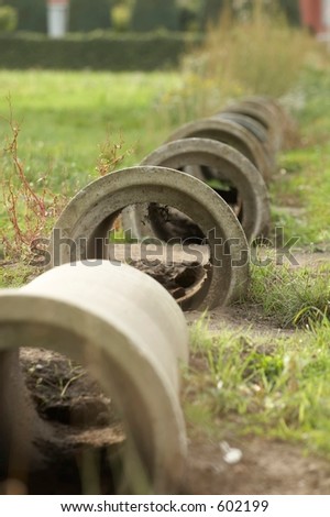 Stone waste pipes symbolizing several difficult steps to take