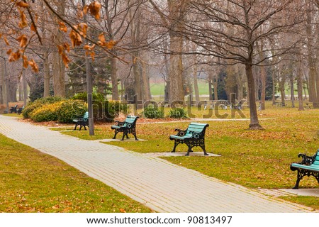 Path and Benches in Park in Oshawa Ontario in December