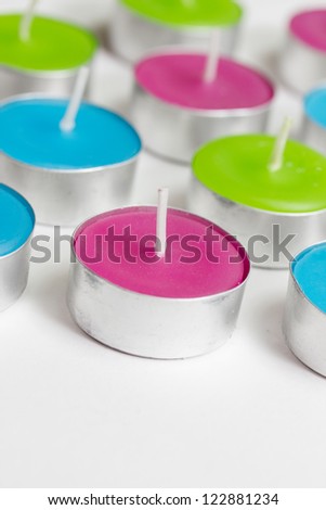 a group colored tealight candles